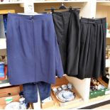 A navy suit, pleated drape (1980/90); a navy suit jacket,