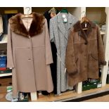A late 1960's wool coat by "Slimfit" with a faux fur collar, fawn in collar with matching buttons,