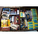 A collection of assorted modern boxed diecast vehicles to include; Burago, Matchbox,