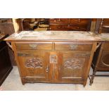 An Edwardian Art Nouveau mahogany mirror backed sideboard