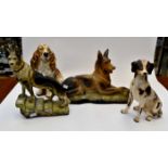 Two large resin figures of Alsatians,