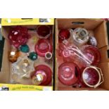 A collection of cranberry glass, some Victorian examples, sugar basins and dishes, bell, tumbler,