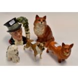 Three Beswick animal figures, ginger cat, reg number 1867, corgi dog and a boxer dog,