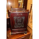 An ornate mahogany purdonuim with metal handles on sides and front, width approx 39cm,