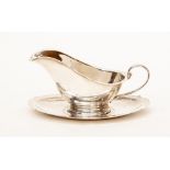 Sterling silver sauce boat and stand