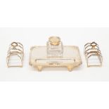 A pair of silver miniature toast racks, Sheffield 1932,