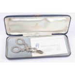 A pair of William IV silver sugar nips,