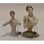 A Pair of art deco 'pierrot' half-doll pin cushions, one on a supporting stand (2).