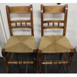 A set of three 19th Century beech and elm side chairs,