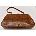 Brown crocodile skin handbag