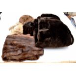 A dark brown faux fur coat late 1950 and a brown mink hat mid brown and a dark brown mink fur hat,