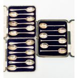 Two sets of six Walker and Hall silver golfing teaspoons,