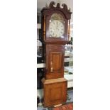 A 19th Century mahogany eight day longcase clock, having a swan neck pediment,