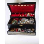 A collection of costume jewellery to include a silver chains and ball locket,