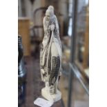 A signed Japanese Ivory carving of a wise man mounted on a horse,