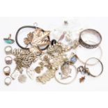 A collection of white metal jewellery including a Victorian fancy link collar, star details,