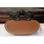 A pair of Heracles lenses in leather case