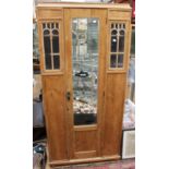 An early 20th Century pine single door wardrobe
