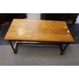 A 1970's oak coffee table.