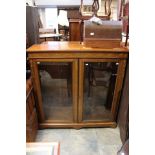 A mahogany inlaid and glazed display cabinet, 125cm high, 118cm wide,