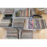 A large quantity of records; boxes of assorted records, to include rock, reggae,