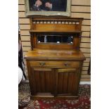 A late Victorian mahogany mirror backed chiffonier, gallery top, mirrored back,