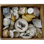 A box of ceramic trinket boxes