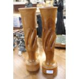 A pair of Pitcairn Island carved wooden vases,