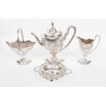 A Victorian silver plate three piece tea service, hexagonal shape chased with flowers,