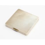 A silver compact powder case, engine turned detail, with gold clasp, Birmingham,