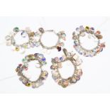 Five silver charm bracelets with enamel