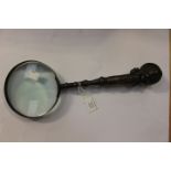 A large magnifying glass, late 19th/early 20th century,