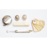 A collection of silver and other sewing implements, tape measure, Sheffield 1905, James Chesterman,