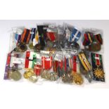 A collection of World Medals to include WW2 British, WW2 Japanese, United Nations, Poland, Rumania,