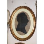 English School, 19th Century, portrait silhouettes of a lady and a gent, a pair, on paper,