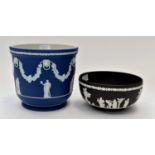 Wedgwood dark blue Jasper Ware jardiniere 19 cms high together with a black basalt Wedgwood fruit