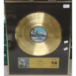 Bloody Tourists gold framed, certified gold LP, Record Sales Award presented to Ric Dixon,