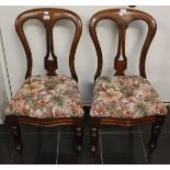 A set of five Victorian mahogany dining chairs, fitted with drop-in seats,