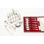 Silver condiment spoon and 8 Italian tea spoons and a sugar spoon, pair of sugar tongs, toast rack,