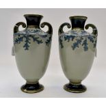 A pair of Arts & Crafts two handled vases, stoneware, having tapering bodies,