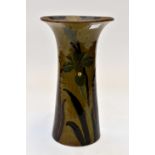 An Edwardian Art Nouveau tapered Faience vase,