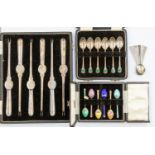 A collection of Elizabeth II silver flatware including a set of six silver lobster picks,