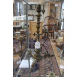 An Arts and Crafts brass table lamp in the manner of W A S Benson,