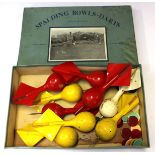 A vintage Spalding bowls, darts, boxed game,
