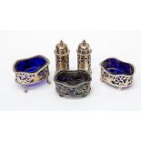 A matched set of three large silver salts and two pepperettes,