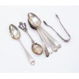 A set of four George III silver teaspoons, London 1805, a further teaspoon London 1802,