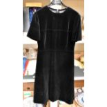 A black velvet short sleeved dress made by Dior for the Diorling label for Harrods,