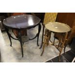 An Edwardian mahogany circular topped table, curved legs,