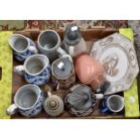 A box of assorted 19th century and later jugs, some in bisque porcelain,