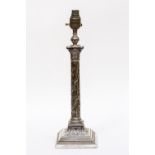 A George V silver plated lamp base cast as a Corinthian column with vine detail,
